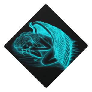 A sleeping Angel Graduation Cap Topper