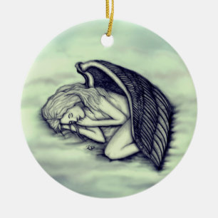 A sleeping Angel on the heavens clouds in green Ceramic Ornament