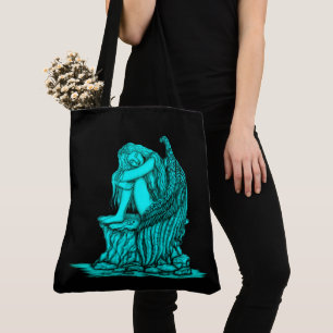 A sleeping Angel on the Stone Tote Bag