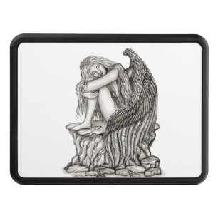 A sleeping Angel on the Stone Trailer Hitch Cover