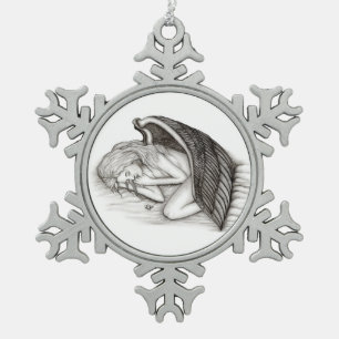 A sleeping Angel Snowflake Pewter Christmas Ornament
