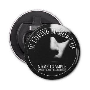 A sleeping face in half shadow bottle opener