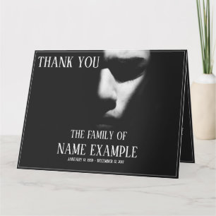 A sleeping face in half shadow card