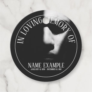 A sleeping face in half shadow favour tags