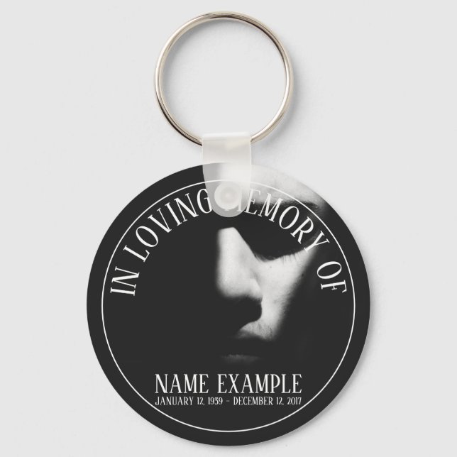 A sleeping face in half shadow keychain (Front)