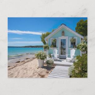 a small beach house in mint color by the sea postcard
