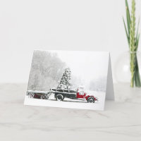 A Snow Covered Truck Sits In A Field