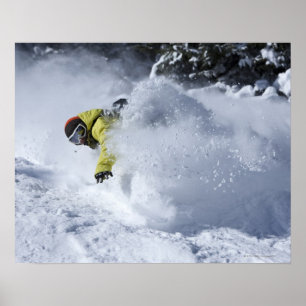 A snowboarder rips untracked powder turns in 2 poster