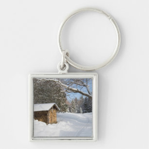 A snowy scene at the AMC's Little Lyford Pond Keychain