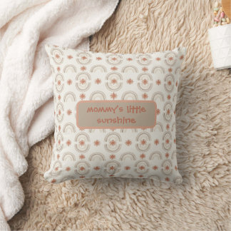 A soft, boho-inspired baby design throw pillow
