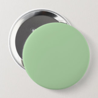 A soft pale green background fills the image 4 inch round button