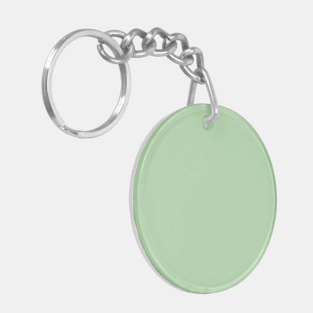 A soft pale green background fills the image keychain (Front Left)