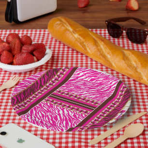 A soft pink and white flower motif gracefully pres paper plate