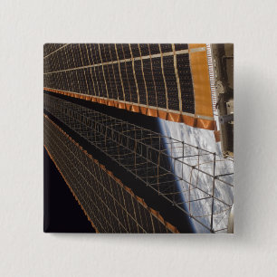 A solar array wing 2 inch square button