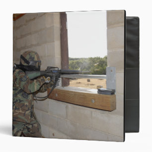 A soldier acts as an opposition force binder