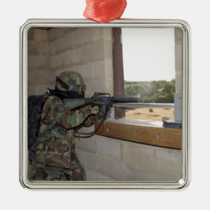 A soldier acts as an opposition force metal ornament