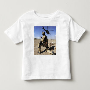 A soldier conducts security for an HH-60 Toddler T-shirt