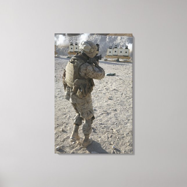 A soldier engages his target on a shooting rang canvas print (Front)