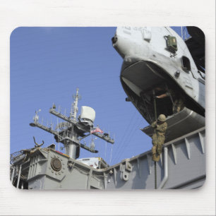 A soldier fast-ropes mouse pad