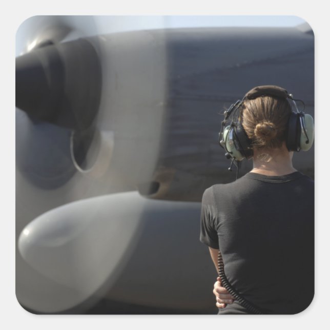 A soldier monitors the performance square sticker (Front)