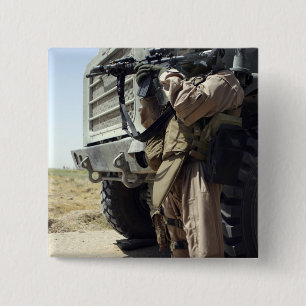 A soldier provides security for Marines 2 Inch Square Button