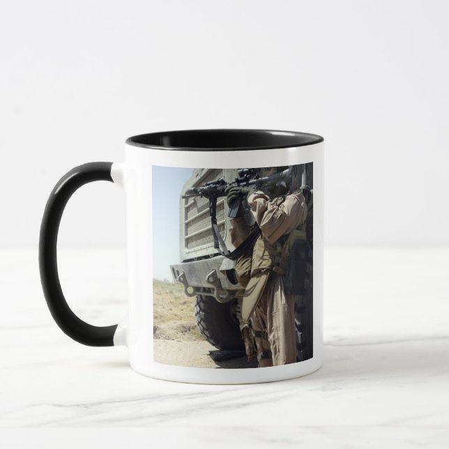 A soldier provides security for Marines Mug (Left)