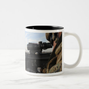 A soldier sights in to fire on a target Two-Tone coffee mug