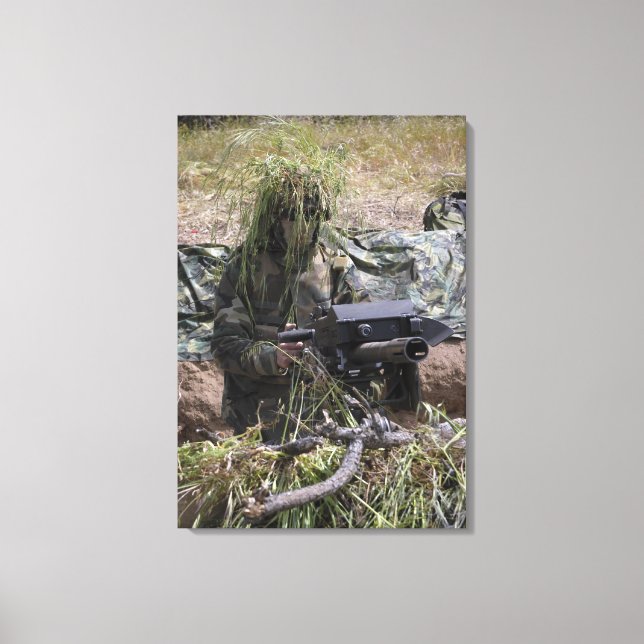 A soldier with MK-19 grenade launcher Canvas Print (Front)