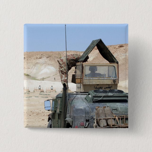 A soldiier instructs an Iraqi army soldier 2 Inch Square Button (Front)