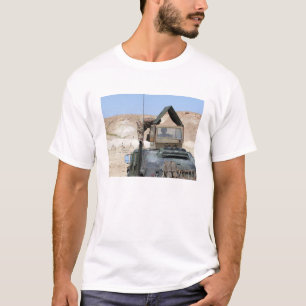 A soldiier instructs an Iraqi army soldier T-Shirt