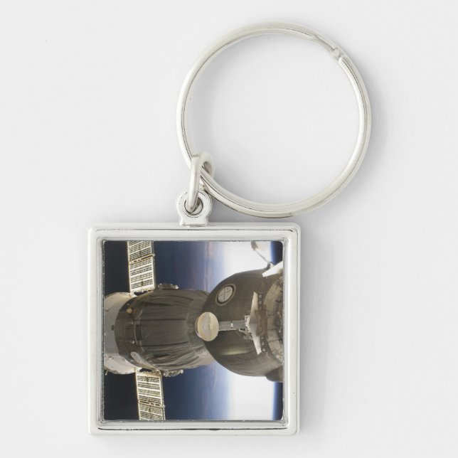 A Soyuz spacecraft backdropped by Earth Keychain (Front)