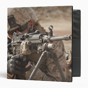 A squad automatic weapon gunner provides securi binder
