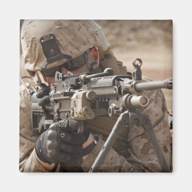 A squad automatic weapon gunner provides securi magnet (Front)