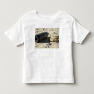 A static display of a converted ordnance shell toddler t-shirt