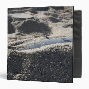 A static display of an ordnance shell binder