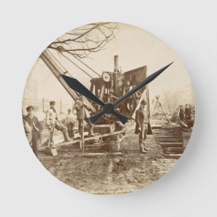 A steam crane in operation during the building of round clock