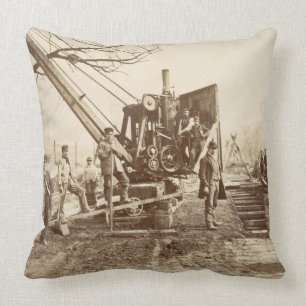 A steam crane in operation during the building of throw pillow