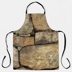 A stone wall made of cobblestones background textu apron