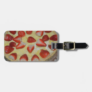 A strawberry cake luggage tag