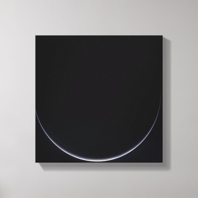 A sun-illuminated crescent of Earth Canvas Print (Front)