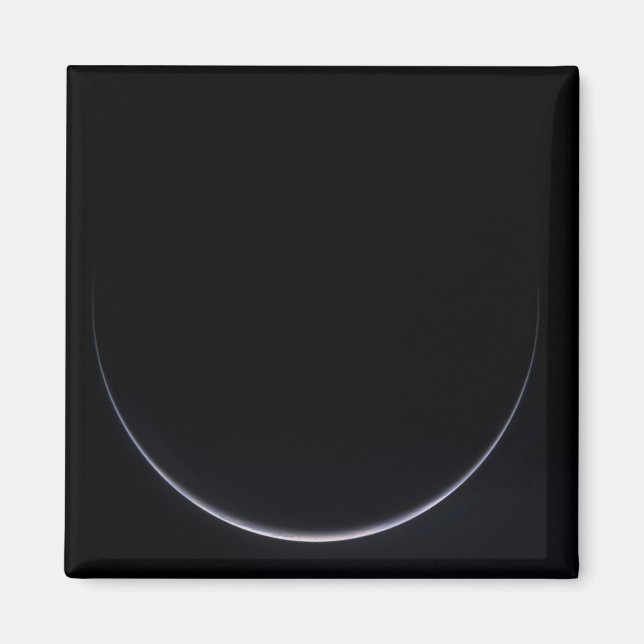 A sun-illuminated crescent of Earth Magnet (Front)