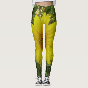 a sunflower in the summer in the garden leggings