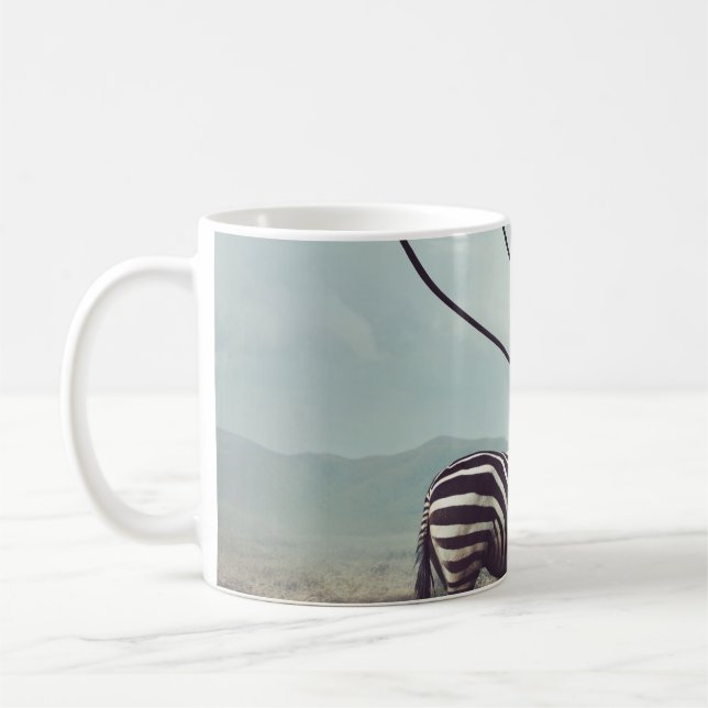 A surreal image of a zebra and two of its black st coffee mug (Left)
