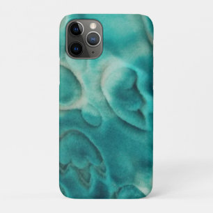 A swirling pattern in teal and light beige iPhone 11 pro case