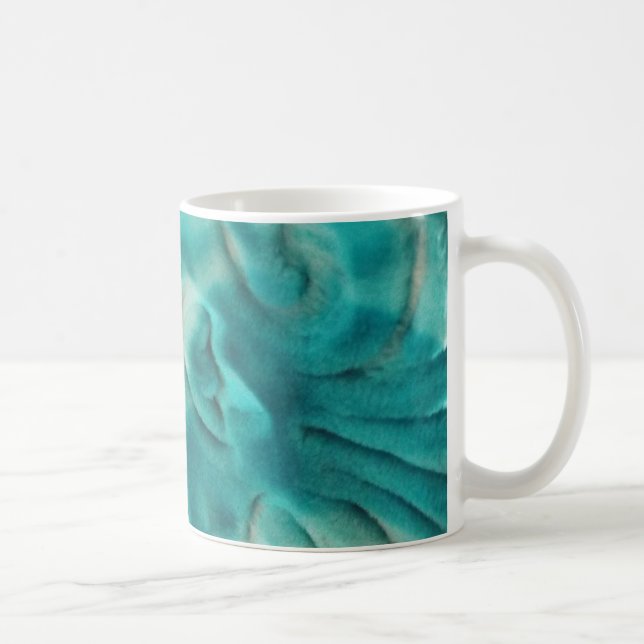 A swirling pattern in teal and light beige coffee mug (Right)