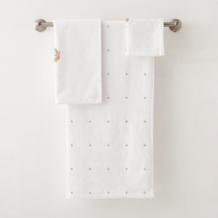 A symmetrical design featuring brown geometric mot bath towel set