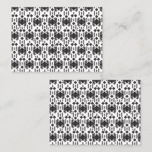 A symmetrical monochrome design featuring intricat appointment card
