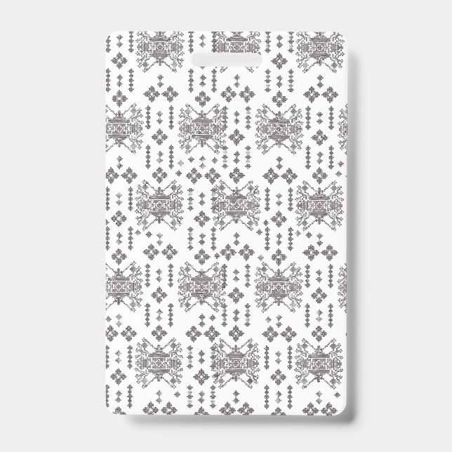 A symmetrical monochrome design featuring intricat badge (Front)