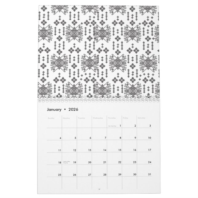 A symmetrical monochrome design featuring intricat calendar (Jan 2026)