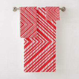 A symmetrical pattern featuring red, orange, and p bath towel set